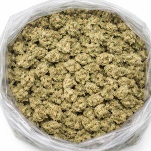 mac 1 cannabis flower buds in an open bag, showing small dense nugs with light green tones and frosty trichome coverage